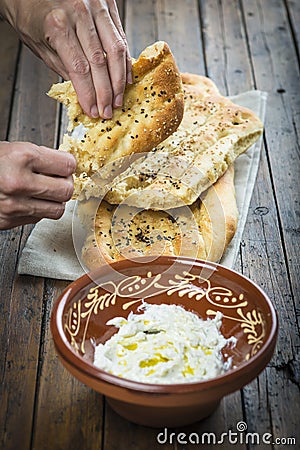 Barbari or Persian bread and strained yogurt Stock Photo