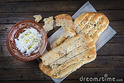 Barbari or Persian bread and strained yogurt Stock Photo