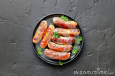 Barbecue bratwurst on plate Stock Photo