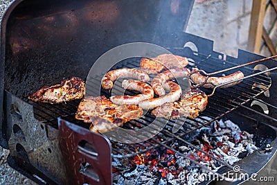 Barbecue with filet steak meat on a charcoal grill. Grilled food concept Stock Photo