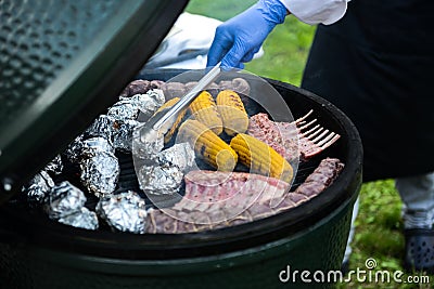 Barbecue ribs and corn on the grill Stock Photo