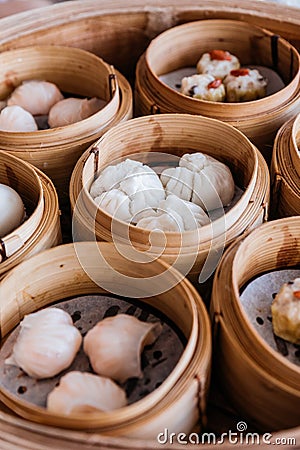 Barbecued pork buns served in steamer baskets with many kind of Dim sum Stock Photo