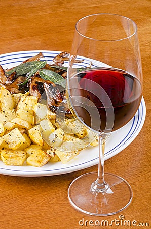 Barbecued Quails with a Glass of Red Wine #1 Stock Photo