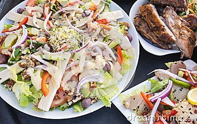 Barbecued Ribs, Smoked Tuna and Salad Stock Photo