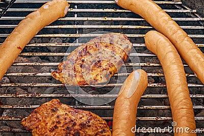 Barbeque sausages and pork chops Stock Photo