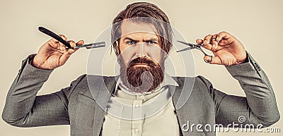 Barber scissors and straight razor, barber shop, suit. Vintage barber shop, shaving. Portrait bearded man Stock Photo