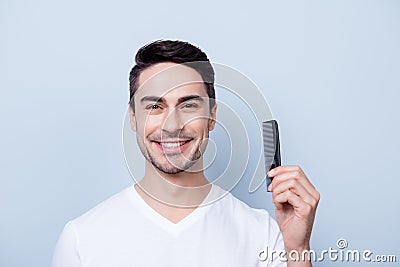 Barber shop concept. Smiling handsome young brunete in white t s Stock Photo