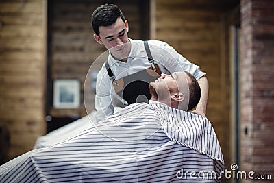 Shaving beard trimmer at the hairdresser Stock Photo