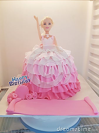 Barbie doll theme cake pink color Editorial Stock Photo