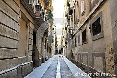 BARCELONA-AUGUST 13: Narrow street in the Gothic Quarter of Barcelona. Editorial Stock Photo