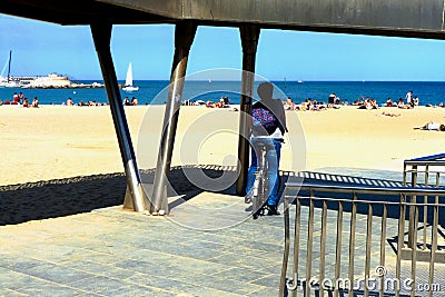 Barcelona beach with blue sea water and suntanning people Editorial Stock Photo