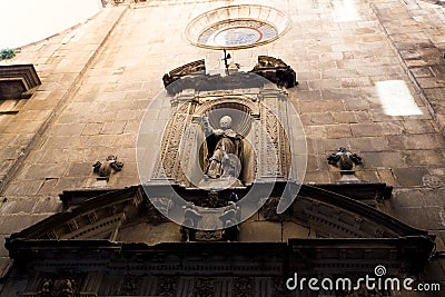 Barcelona, Catalonia, Spain, September 22, 2019. Details of the exterior historical buildings. Ancient bas-reliefs on the windows Editorial Stock Photo