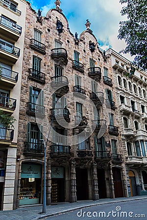 Barcelona, Catalonia, Spain, September 22, 2019. Details of the exterior historical buildings. Ancient bas-reliefs on the windows Editorial Stock Photo