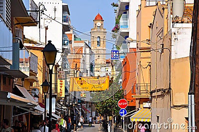 BARCELONA-JULY 25: Narrow street in Barcelona on July 25, 2013 in Barcelona. Catalonia, Spain. Editorial Stock Photo