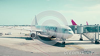 BARCELONA, SPAIN - APRIL, 15, 2017. Close-up pan shot of Qatar Airways Airbus airliner boarding at the airport Editorial Stock Photo