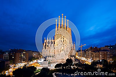 Barcelona, Spain - April 10,2018 : Night view of the Sagrada Familia, a large Roman Catholic church in Barcelona, Spain, designed Editorial Stock Photo