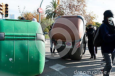 Barcelona, Spain - 21 decemer 2018: young catalan independists, called Cdr, clash with police during a cabinet meeting in Llotja Editorial Stock Photo