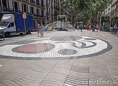 Barcelona, Spain Juan Miro mosaic with crowd on La Rambla area. Editorial Stock Photo