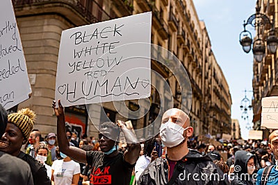 Barcelona, spain - 7 june 2020: Black lives matter crowd march demanding end of police brutality and racism against african- Editorial Stock Photo