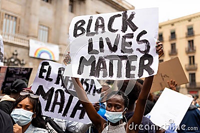 Barcelona, spain - 7 june 2020: Black lives matter crowd march demanding end of police brutality and racism against african- Editorial Stock Photo