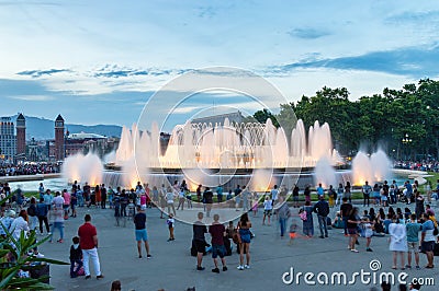 Undefined people watching Magic Fountain light show. Editorial Stock Photo