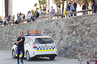 Barcelona, Spain - MAY 23, 2020: Barcelona beach police car. Covid 19 coronaviruse disease. Barcelona beach closed. Protect Editorial Stock Photo