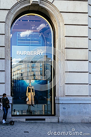 Barcelona, Spain - May 11, 2021. Logo and facade of Burberry, a British luxury fashion brand, manufactures clothing and other Editorial Stock Photo