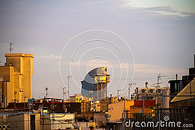 Barcelona, Spain - May 26 2022: View of the roofs of houses in the old district in Barcelona, Spain on sunset Editorial Stock Photo