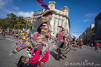 Barcelona, Spain. 12 Ocober 2019: Bolivian Tinkus San Simon dancers during Dia de la Hispanidad in Barcelona. Editorial Stock Photo