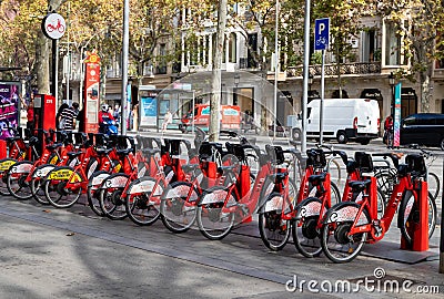 Barcelona, Spain - Oct 28, 2022, BICING automated bicycle parking on a city street. Rental of new quality bikes. Editorial Stock Photo