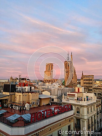 Barcelona, Spain - Rooftoops view in Barcelona, at beautiful pink sunrise, Spain Editorial Stock Photo