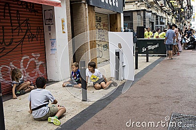 A company of children plays a ball outdoors Editorial Stock Photo