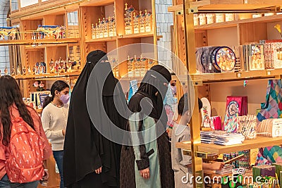 Barcelona, Spain - September 19, 2021: Muslim women wearing a Burka, traditional clothing worn by women in some Islamic countries Editorial Stock Photo