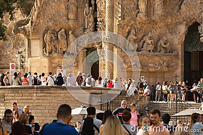 BARCELONA, SPAIN - September 25th, 2018: Tourists standing in line to enter Sagrada Familia church, Antonio Gaudi`s architectural Editorial Stock Photo