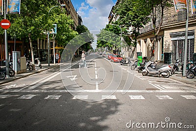 Barcelona street with sunshine and blue sky Editorial Stock Photo