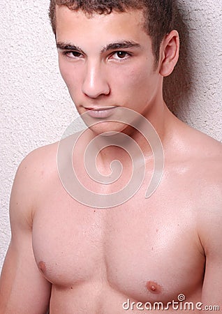 Bare chested young man Stock Photo