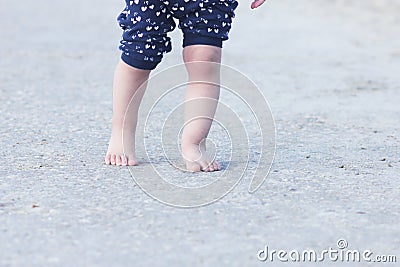 Barefoot child legs Stock Photo