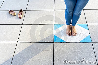 Bare feet on cement floor, moment yoga Stock Photo