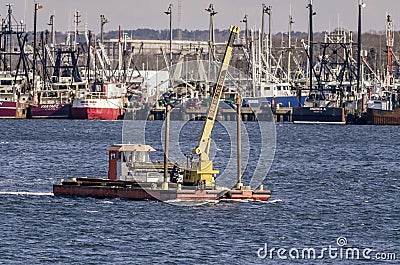 Barge making her way along Fairhaven shoreline Editorial Stock Photo