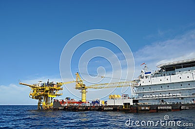 Barge and tug boat in open sea,Oil and gas platform in the gulf or the sea, The world energy, Offshore oil and rig construction Stock Photo