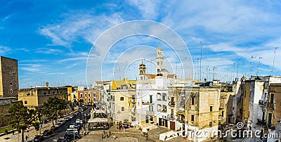 Bari, Italy - March 10, 2019: View of the Svevo castle and the square of Federico II di Svevia a spring day with a background of Editorial Stock Photo