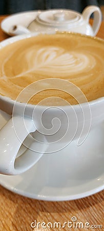 Barista art on coffee froth. Stock Photo