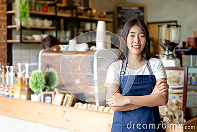 Barista asian women Cafe Making Coffee Preparation Stock Photo