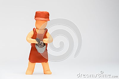 Barista made from plasticine on white background, aligned to the left Stock Photo