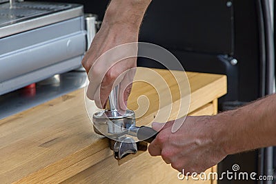 Barista makes coffee Stock Photo