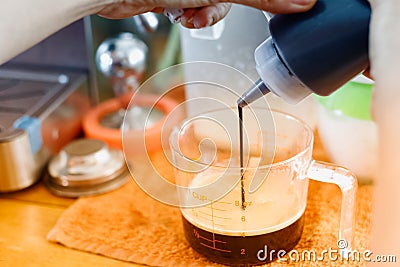 Barista makes latte closeup Stock Photo