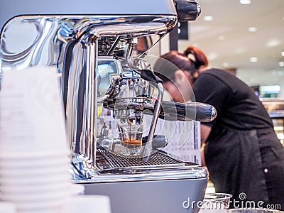 Barista prepares latte Stock Photo
