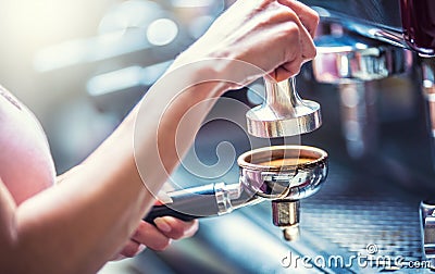 Barista woman making an espresso coffee. Stock Photo