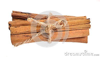 Bark from Cinnamomum verum or true cinnamon or Ceylon cinnamon. Isolated on white background Stock Photo