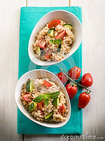 Barley risotto with zucchinis Stock Photo